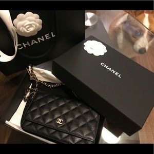 Chanel WOC black caviar with gold hardware